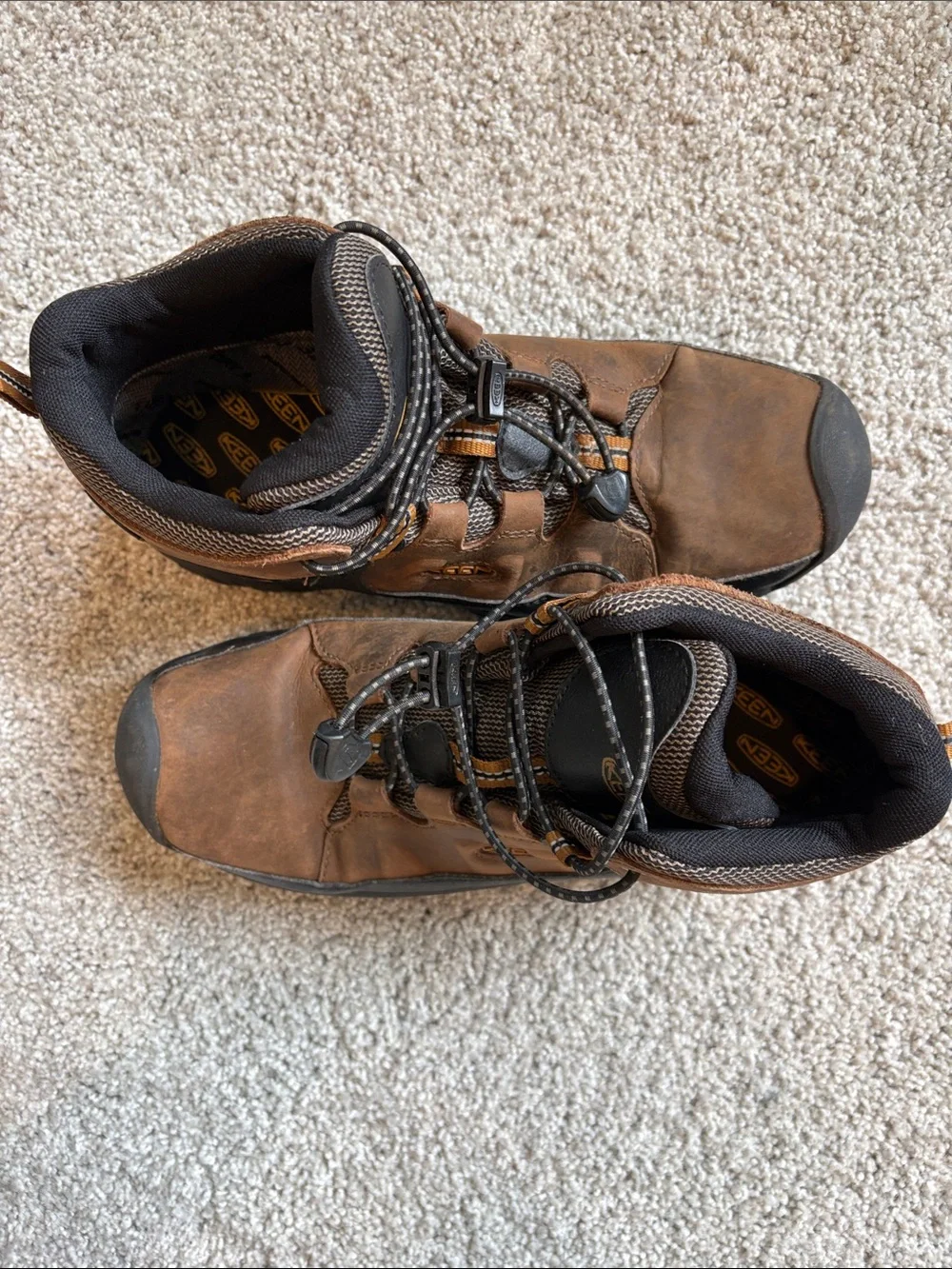 Keen Men's Brown and Black Trail Boots with Orange Accents